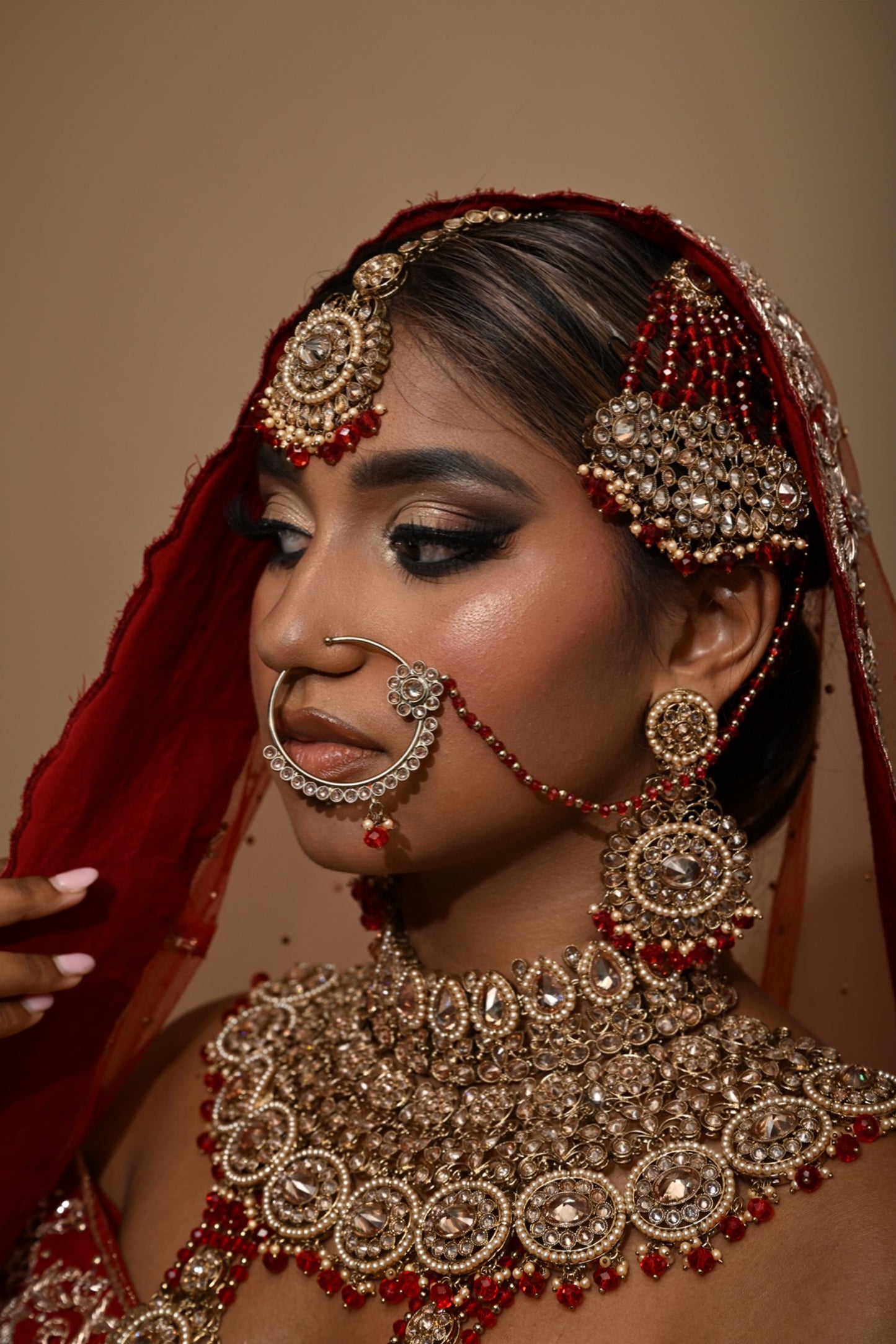 Rood-gouden sieradenset met grote steentjes - Indiase bruids sieraden