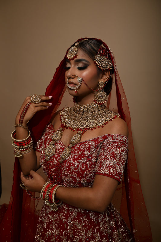 Rood-gouden sieradenset met grote steentjes - Indiase bruids sieraden