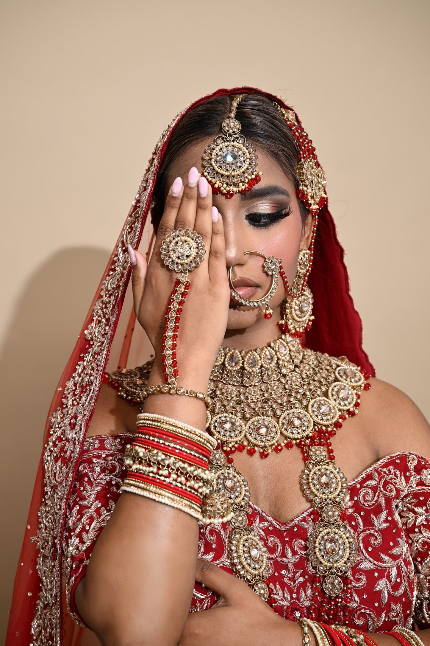 Rood-gouden sieradenset met grote steentjes - Indiase bruids sieraden