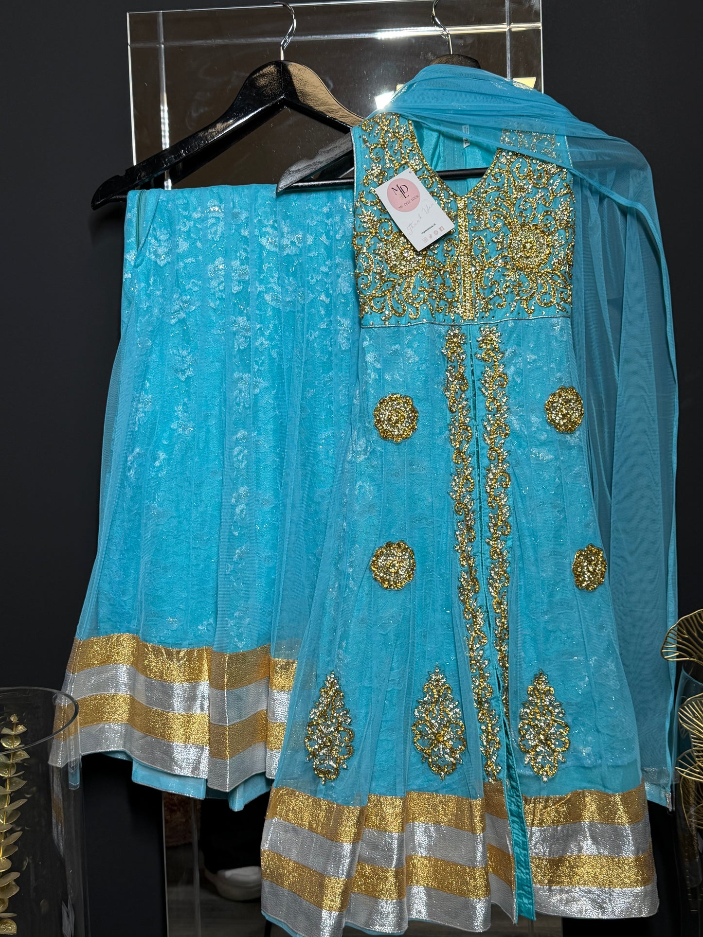 Turquoise blauwe set met goud